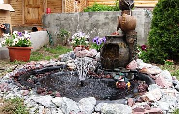 Дизайн фонтанов на садовом участке
